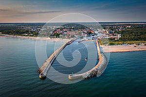 Beautiful sunrise over the Ustka harbour by the Baltic Sea, Poland