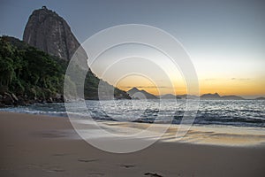 Beautiful Sunrise at the Red Beach, Praia Vermelha, with the Sugarloaf Mountain, Rio de Janeiro photo