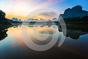 Beautiful sunrise and reflections at Nongtalay lagoon