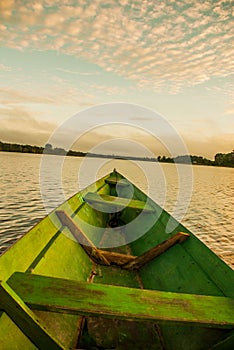 Beautiful sunrise on the river. View from the boat at Amazon river, with a dense forest on the shore and blue sky, Anazonas,