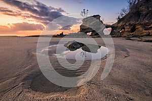 Sunrise at Watuparunu Beach, Sumba Island, Indonesia photo