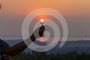 Beautiful sunrise,Silhouette peple with in sunrise, Thailand.