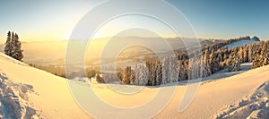 Beautiful Sunrise in snow mountains landscape. Amazing yellow Sunshine. Allgau, Mittag Mountain, Bavaria, Alps, Germany.