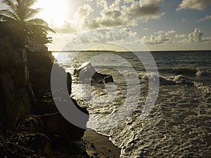 Beautiful sunrise and stranded boat