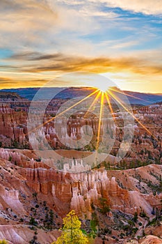 Beautiful sunrise with sunrays at Bryce Canyon national Park in