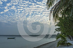 Beautiful sunrise of sunset at Ohoidertawun beach in Kei kecil island. Interesting clouds in blue sky