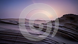 Beautiful sunrise sunset time lapse in the desert behind the fossils rock dune of Abu Dhabi