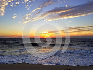 Beautiful sunrise and waves in the early morning near Dewey Beach, Delaware, U.S.A