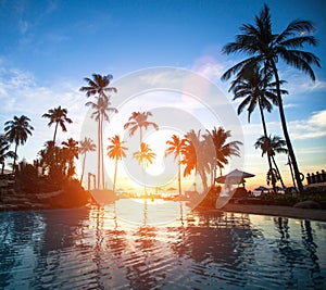 Beautiful sunset at a beach resort in the tropics. Travel.