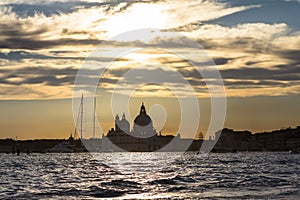 Sunset behind the Church of Madonna Della Salute in Venice