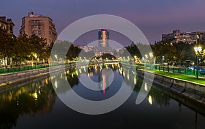 Beautiful sunset Bucharest Romania Bucuresti Dambovita river landscape reflection