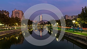 Beautiful sunset Bucharest Romania Bucuresti Dambovita river landscape reflection