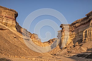 Beautiful sunset in the canyons of the Namibe Desert. Africa. Angola photo