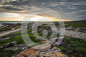 Beautiful sunset at Cape Agulhas, southernmost point of Africa