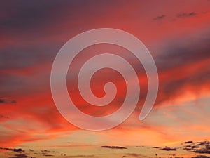 Beautiful sunset clouds fire red dawn reflection photo