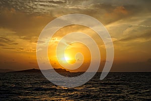 Beautiful sunset copyspace sea windy wave view with light reflection, beautiful shades of wide sweet orange color sky