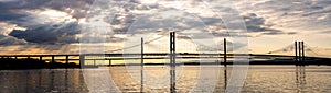 Beautiful sunset at The Forth road bridge and Queensferry crossing bridge Edinburgh