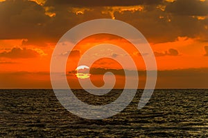 Beautiful sunset and golden twilight, and clouds over the Mediterranean Sea in Tel Aviv, Israel