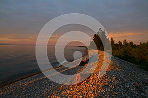 Beautiful sunset on lake Baikal in summer, Vydrino village