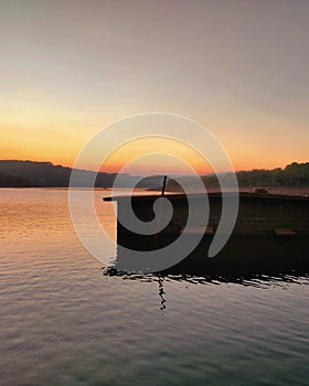 Beautiful sunset at the lake, mahabhaleshwar India.