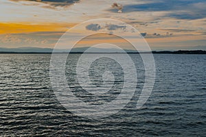 Beautiful Sunset at Lake. Water Landscape at Sunset