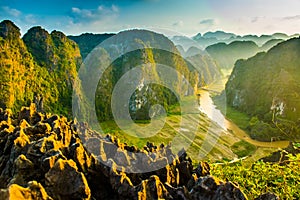 Beautiful sunset landscape viewpoint from the top of Mua Cave mountain, Ninh Binh, Tam Coc, Vietnam