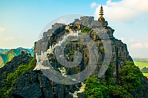 Beautiful sunset landscape viewpoint from the top of Mua Cave mountain, Ninh Binh, Tam Coc, Vietnam photo