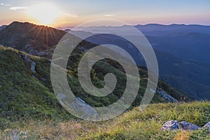 Beautiful sunset mountain view from the entrances on the path to the Kozya Stena hut. The Troyan Balkan is exceptionally