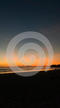 Beautiful Sunset with nice sky on black sand beach