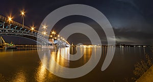 Beautiful sunset night over Rhine / Rhein river and old bridge i