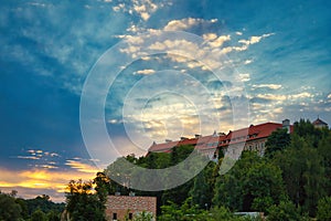 Beautiful sunset over the Bendetictine abbey in Tyniec, Poland. photo