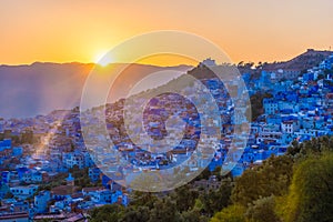 Beautiful sunset over the cityscape of Chefchaouen, the blue city of Morocco