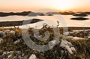 Beautiful sunset over the famous Kornati national park in Croatia, Europe, view from the top of the Zut island