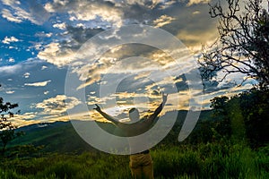 BEAUTIFUL SUNSET OVER THE FIELDS AND MOUNTAINS OF COLOMBIA