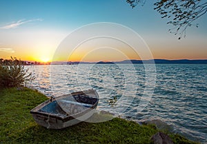 Beautiful sunset over Lake Balaton with a boat