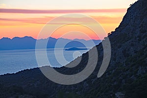 A beautiful sunset over a lake and mountain in Turkey