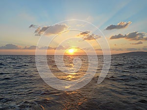 Beautiful sunset over Lake Superior with a sail boat