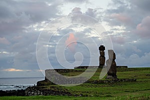 Beautiful sunset over Moai Statues in Hanga Roa