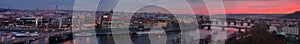Beautiful sunset over Prague. Panorama of the city with the Vltava River in the foreground - Czech Republic