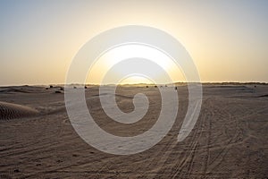 Beautiful sunset over Sahara desert in Douz, Tunisia. Sand and dunes against sky