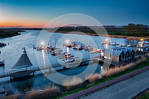 Beautiful sunset over the Vistula river at the Sobieszewo Island, Gdansk. Poland photo