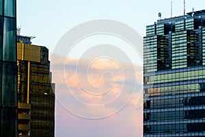 Beautiful sunset with pastel colors reflecting on high rise office buildings