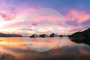 Beautiful sunset on the reservoir landscape Thailand