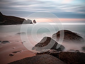 Beautiful sunset on Robayera beach in Miengo, Cantabria photo