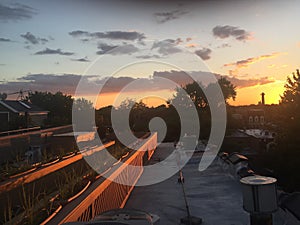 beautiful sunset on the roof of a home