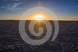 Beautiful sunset in Salar de Uyuni, Bolivia photo