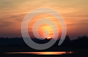 Beautiful sunset scenery near the lake. Latvia, Vidzeme.