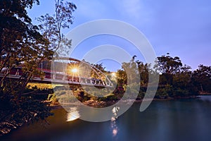 Beautiful sunset scenics of Concentric bridge with Plumeria pine parks in Sun Moon Lake