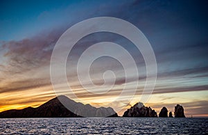 Beautiful Sunset of Seascape with Mountains silhouets. Sea off the Coast of Cabo San Lucas. Gulf of California also known as the