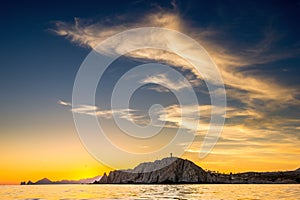 Beautiful Sunset of Seascape with Mountains silhouets. Sea off the Coast of Cabo San Lucas. Gulf of California also known as the photo